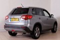 Suzuki Vitara - 1.6i 120PK EXCLUSIVE NAVIGATIE CAMERA ECC BLUETOOTH CRUISE STOELVERW. LMV17 TREKHAAK - 1 - Thumbnail