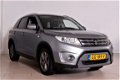 Suzuki Vitara - 1.6i 120PK EXCLUSIVE NAVIGATIE CAMERA ECC BLUETOOTH CRUISE STOELVERW. LMV17 TREKHAAK - 1 - Thumbnail