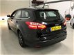 Ford Focus Wagon - 1.6 TDCI ECOnetic Lease Titanium Bj.13|navi|pdc|lmv|vol opties - 1 - Thumbnail