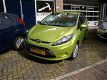 Ford Fiesta - 1.25 Limited airco slechts 61608 km - 1 - Thumbnail