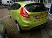 Ford Fiesta - 1.25 Limited airco slechts 61608 km - 1 - Thumbnail