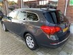 Opel Astra Sports Tourer - 1.4 Turbo Business + | lichtmetalen wielen | navigatie | cruise control | - 1 - Thumbnail
