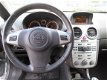 Opel Corsa - 1.4-16V Cosmo / Clima / Fietsendrager / Lmv - 1 - Thumbnail