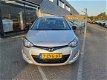 Hyundai i20 - 1.2i Go | LM velgen | Airco | 5 deurs | Getint glas - 1 - Thumbnail