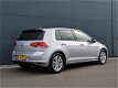 Volkswagen Golf - 1.0 TSI 116PK Comfortline | Sportstoelen | Navigatie | Achteruitrijcamera | Parkee - 1 - Thumbnail