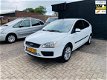 Ford Focus - 1.6 TDCI Futura airco cruise control aux dealer onderhouden - 1 - Thumbnail