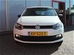 Volkswagen Polo - 1.0i 5drs Highline (navi, stoelverw, lmv, pdc v+a) - 1 - Thumbnail