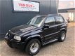 Suzuki Grand Vitara - 2.0 Metal Top Wide Body - 1 - Thumbnail