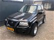 Suzuki Grand Vitara - 2.0 Metal Top Wide Body - 1 - Thumbnail