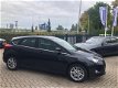 Ford Focus - 1.0 EcoBoost Titanium CLIMATE / CRUISE / PARKEERSENSOREN / LMV - 1 - Thumbnail