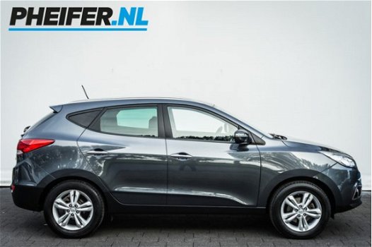 Hyundai ix35 - 2.0i Style Automaat Full map navigatie/ Trekhaak/ Climate control/ Lmv/ Cruise contro - 1