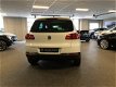 Volkswagen Tiguan - 1.4 TSI Sport&Style 160 Pk, Panodak, Leer, Navigatie, Aut. inparkeren - 1e Eig / - 1 - Thumbnail