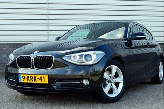 BMW 1-serie - 114i Sport RIJKLAAR PRIJS-GARANTIE Navigatie Xenon Sport Interieur - 1