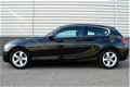 BMW 1-serie - 114i Sport RIJKLAAR PRIJS-GARANTIE Navigatie Xenon Sport Interieur - 1 - Thumbnail