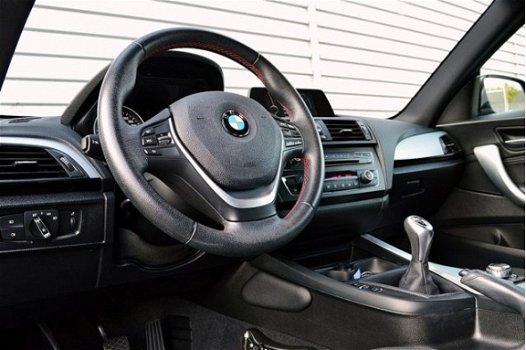 BMW 1-serie - 114i Sport RIJKLAAR PRIJS-GARANTIE Navigatie Xenon Sport Interieur - 1