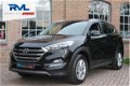 Hyundai Tucson - 1.6 GDi Premium 2015 88.766KM Fabrieksgarantie Navi Leder Climate 1e Eigenaar - 1 - Thumbnail