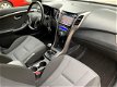 Hyundai i30 - 1.4i i-Motion Navi/Cam/16inch/Afn.Trekhaak - 1 - Thumbnail