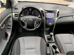 Hyundai i30 - 1.4i i-Motion Navi/Cam/16inch/Afn.Trekhaak - 1 - Thumbnail