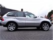 BMW X5 - 4.4i High Executive | 20 inch | Xenon | Navigatie | Panorama | Comfort stoelen | AUT | Led - 1 - Thumbnail