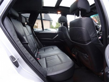 BMW X5 - 4.4i High Executive | 20 inch | Xenon | Navigatie | Panorama | Comfort stoelen | AUT | Led - 1