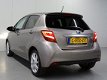 Toyota Yaris - 1.5 Hybrid Dynamic | Panoramadak | Safety Sense | Keyless | Regen en lichtsensor| - 1 - Thumbnail