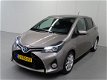 Toyota Yaris - 1.5 Hybrid Dynamic | Panoramadak | Safety Sense | Keyless | Regen en lichtsensor| - 1 - Thumbnail