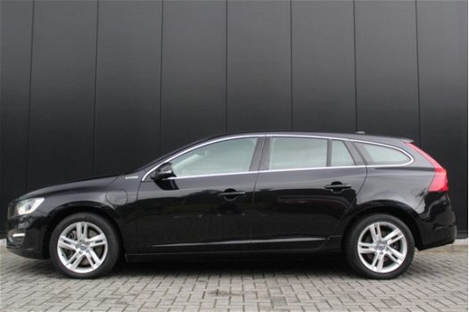 Volvo V60 - D6 Hybrid Summum incl BTW | Lederen bekleding / Xenon verlichting / All Season banden - 1