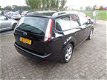 Ford Focus Wagon - 1.6 Comfort navigatie, sportvelgen - 1 - Thumbnail