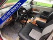 Chevrolet Suburban - grijs kenteken , dubbel cabine op lpg - 1 - Thumbnail