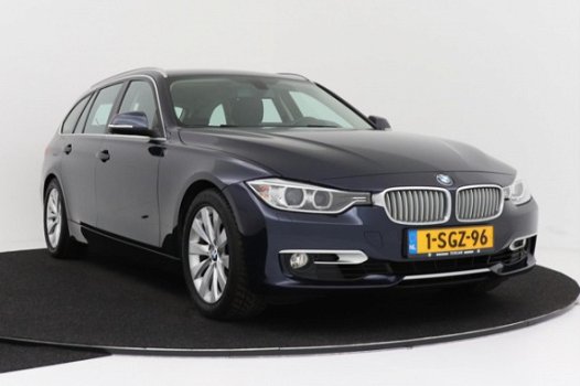 BMW 3-serie Touring - 320i High Executive | Navigatie | Parkeersensoren | Trekhaak - 1