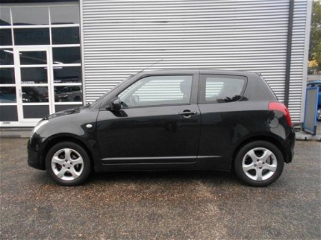 Suzuki Swift - 1.3 EXCLUSIVE - 1