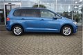 Volkswagen Touran - 1.2 TSI Comfortline NAVIGATIE | PARKEERSENSOREN VOOR & ACHTER | TREKHAAK | CLIMA - 1 - Thumbnail