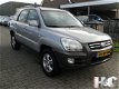 Kia Sportage - 2.0 CVVT 2WD Comfort - 1 - Thumbnail