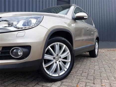 Volkswagen Tiguan - 1.4TSi 161pk Autom Highline Plus RIJKLAAR 100% onderhouden xenon+led, beige lede - 1