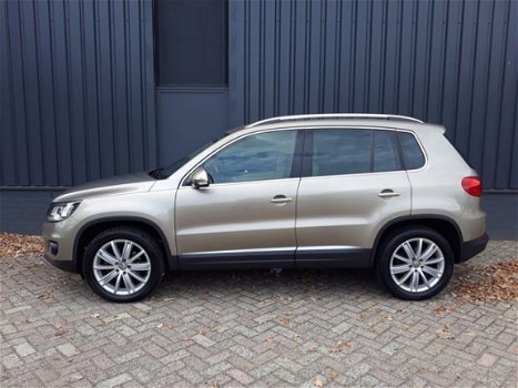 Volkswagen Tiguan - 1.4TSi 161pk Autom Highline Plus RIJKLAAR 100% onderhouden xenon+led, beige lede - 1