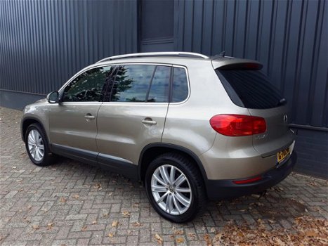 Volkswagen Tiguan - 1.4TSi 161pk Autom Highline Plus RIJKLAAR 100% onderhouden xenon+led, beige lede - 1