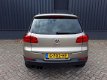 Volkswagen Tiguan - 1.4TSi 161pk Autom Highline Plus RIJKLAAR 100% onderhouden xenon+led, beige lede - 1 - Thumbnail