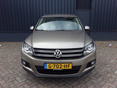 Volkswagen Tiguan - 1.4TSi 161pk Autom Highline Plus RIJKLAAR 100% onderhouden xenon+led, beige lede - 1