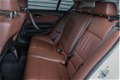 BMW 1-serie - 118i Business Line Ultimate Edition 143PK 90dKM Leder Sportstoelen Sportstuur Xenon Na - 1 - Thumbnail