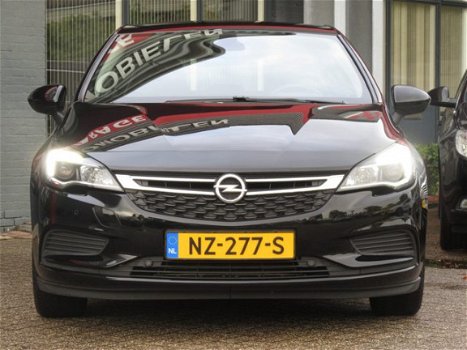 Opel Astra - Online Edition 105pk | AIRCO | NAVIGATIE + MEDIA | PARKEERSENSOREN + CAMERA | BOVAG GAR - 1