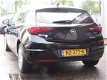 Opel Astra - Online Edition 105pk | AIRCO | NAVIGATIE + MEDIA | PARKEERSENSOREN + CAMERA | BOVAG GAR - 1 - Thumbnail