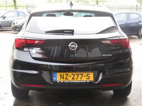 Opel Astra - Online Edition 105pk | AIRCO | NAVIGATIE + MEDIA | PARKEERSENSOREN + CAMERA | BOVAG GAR - 1