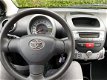 Toyota Aygo - 1.0 VVT-i Now|5-deurs|Airco|NL-auto|1e.Eigenaar - 1 - Thumbnail