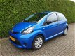 Toyota Aygo - 1.0 VVT-i Now|5-deurs|Airco|NL-auto|1e.Eigenaar - 1 - Thumbnail