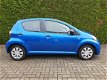 Toyota Aygo - 1.0 VVT-i Now|5-deurs|Airco|NL-auto|1e.Eigenaar - 1 - Thumbnail