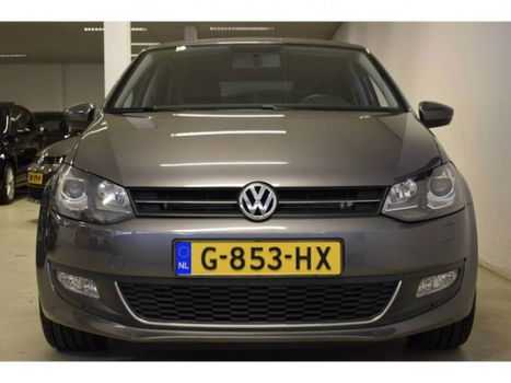 Volkswagen Polo - 1.2tsi Highline Xenon Climate Cruise Handsfree - 1