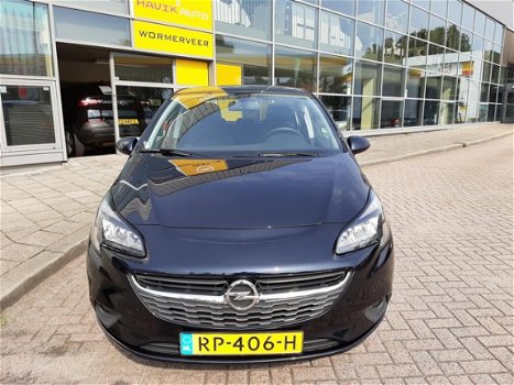 Opel Corsa - 1.4 16V 90pk 5Drs. Favourite Navi Blue tooth 16 Inch Parkpilot - 1
