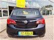 Opel Corsa - 1.4 16V 90pk 5Drs. Favourite Navi Blue tooth 16 Inch Parkpilot - 1 - Thumbnail