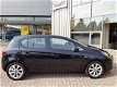 Opel Corsa - 1.4 16V 90pk 5Drs. Favourite Navi Blue tooth 16 Inch Parkpilot - 1 - Thumbnail