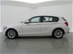 BMW 1-serie - 114i EDE URBAN WIT PARELMOER 5-DEURS *84.826 KM - 1 - Thumbnail